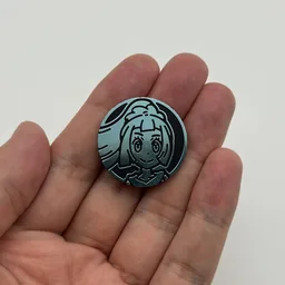 In hand, from Pokémon Coin Fan, full size