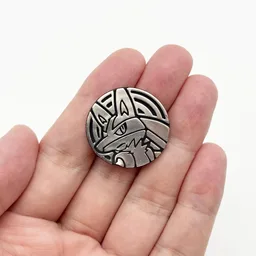 In hand, from Pokémon Coin Fan, full size